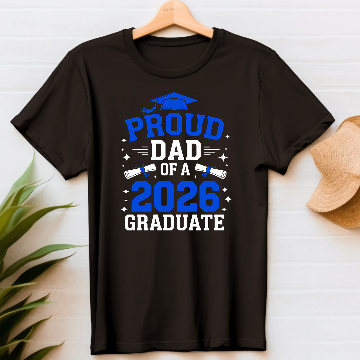 Black t-shirt with 'Proud Dad of a 2026 Graduate' text on a white background