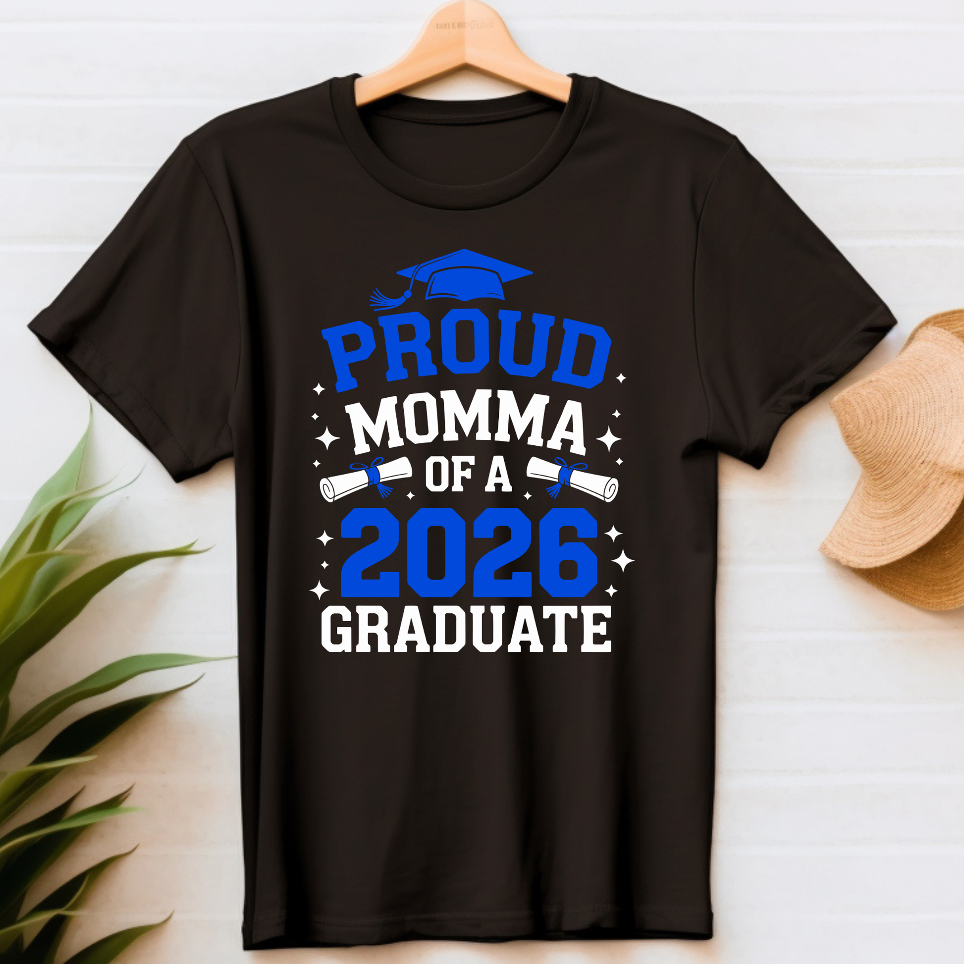 Black t-shirt with 'Proud Momma of a 2026 Graduate' text on a white background