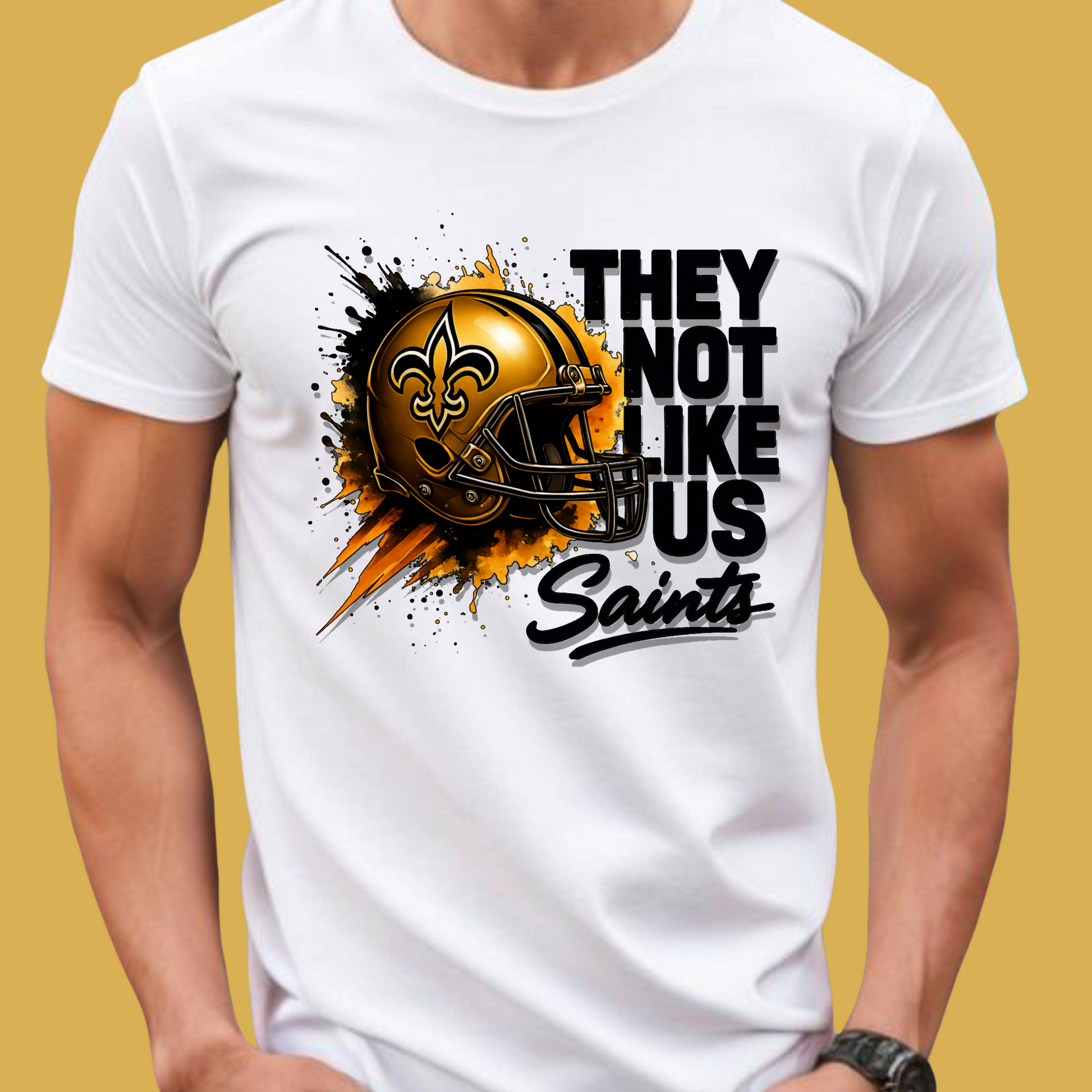 White t-shirt with a football helmet graphic and text on a yellow background Saints Mascot Shirt - Ultimate Saints Fan They Not Like Us Tee