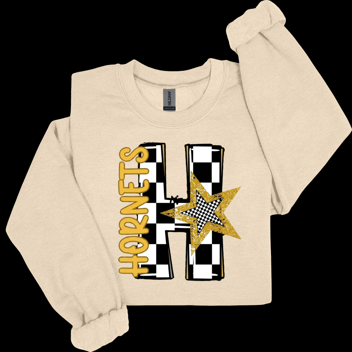 A cream-colored long-sleeve sweatshirt with a 'Alabama State' graphic on the front, featuring a football and paint-splatter design in black, gold, and brown, displayed on a solid black background.