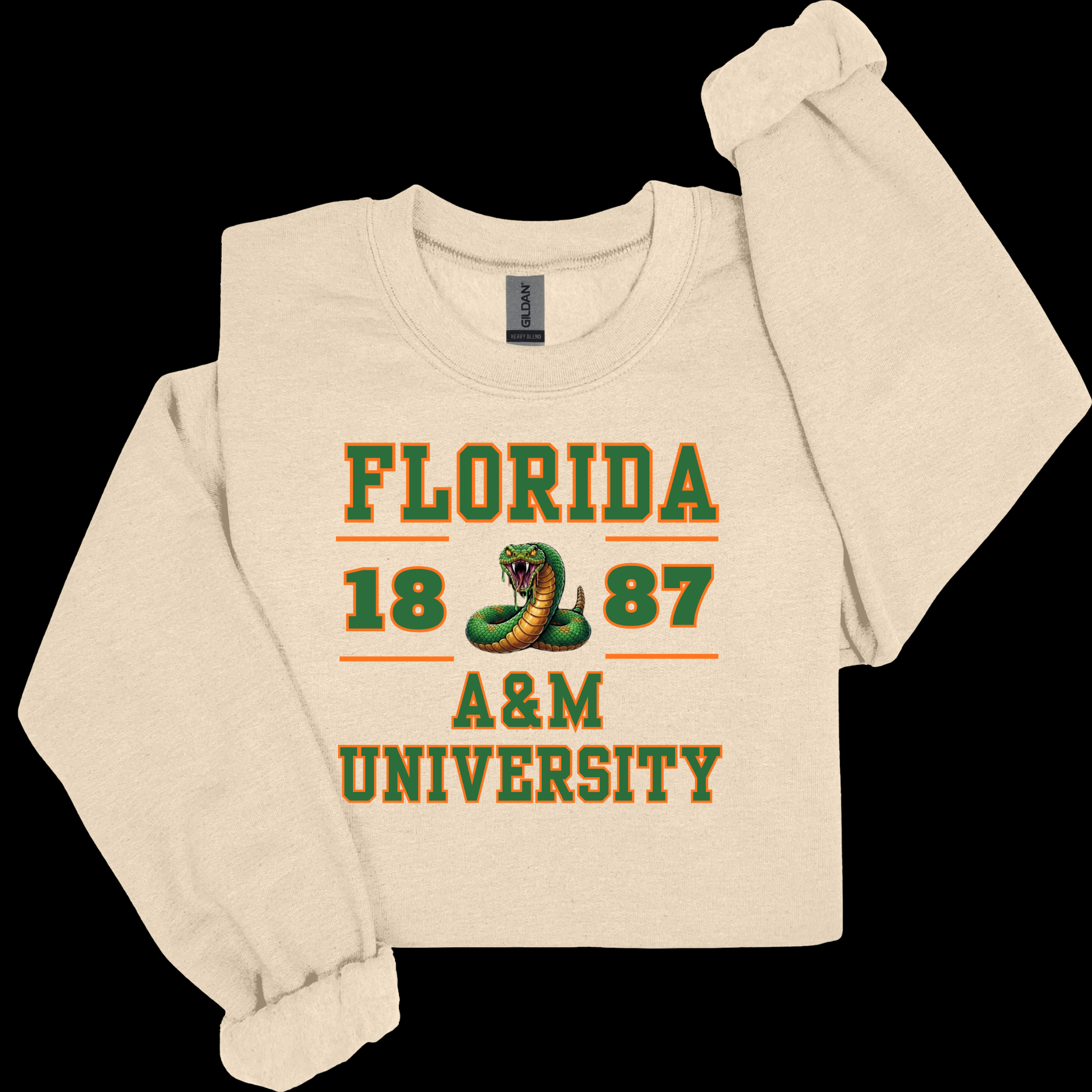 A cream-colored long-sleeve sweatshirt with a 'Alabama State' graphic on the front, featuring a football and paint-splatter design in black, gold, and brown, displayed on a solid black background.