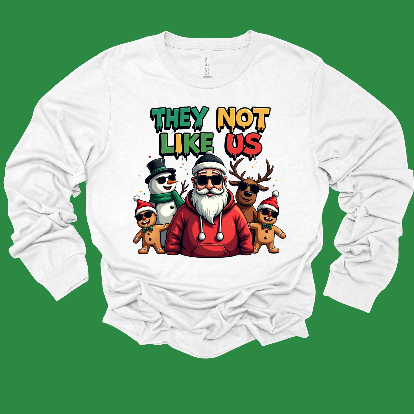 White long-sleeve shirt with Christmas-themed graphic on a green background