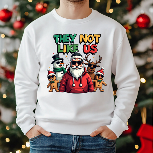 White sweatshirt with Christmas-themed design featuring Santa Claus and other characters in front of a decorated Christmas tree.