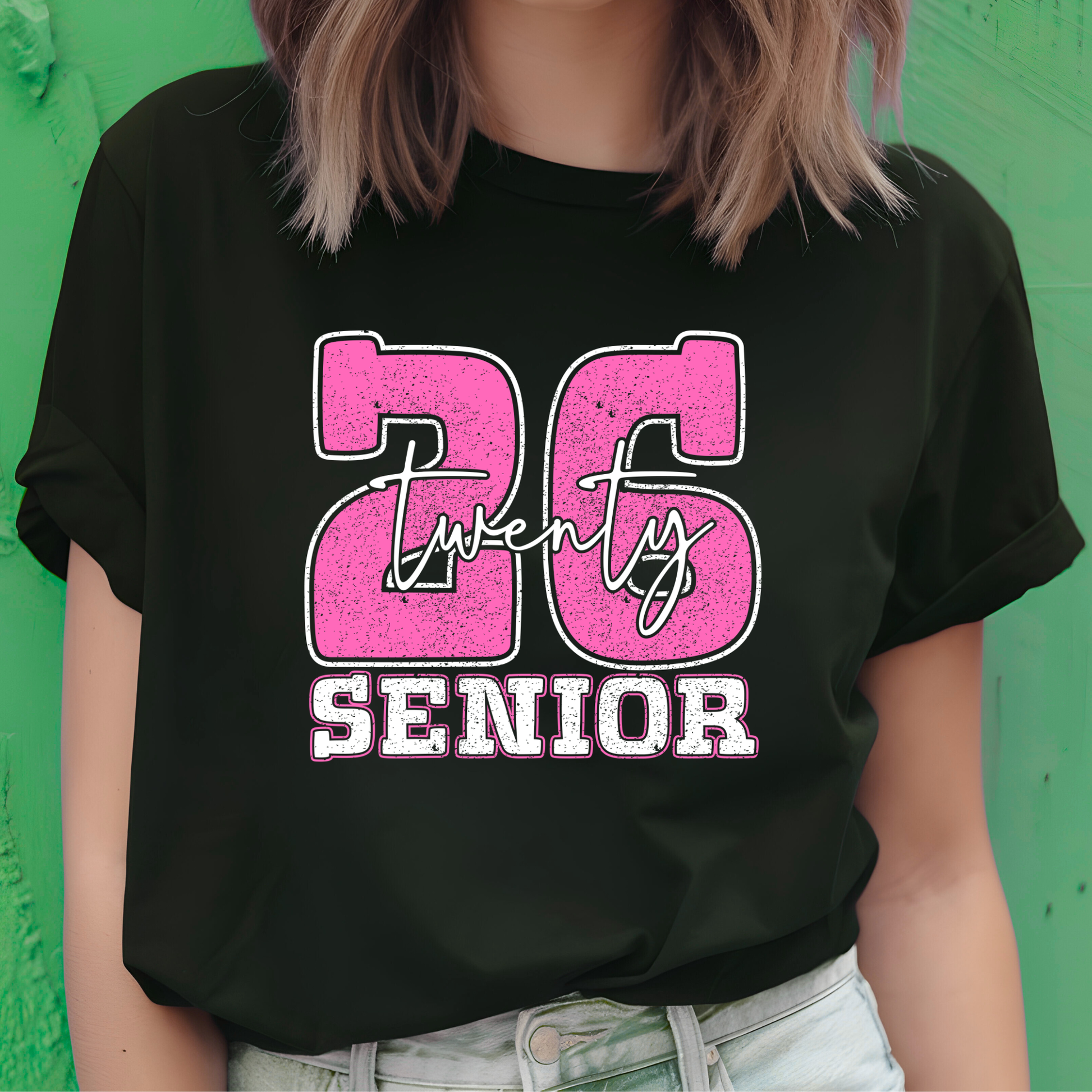 Person wearing a black t-shirt with pink and white text against a green  background Senior 2026 T-Shirt - Graduating Senior - Customizable Class of 2026 Shirt
