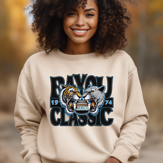 Person wearing a beige sweatshirt with a tiger and panther design and 'BAYOU CLASSIC' text.  Southern Jags Bayou Classic Apparel - Tailgating T-Shirt, Hoodie & Sweater