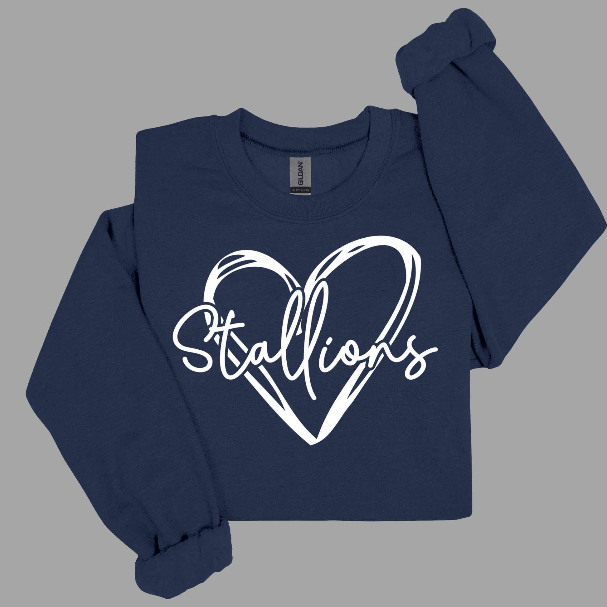 A navy blue long-sleeve sweatshirt with a white graphic print of a heart and the word 'Stallions' across the chest, displayed on a solid gray background.