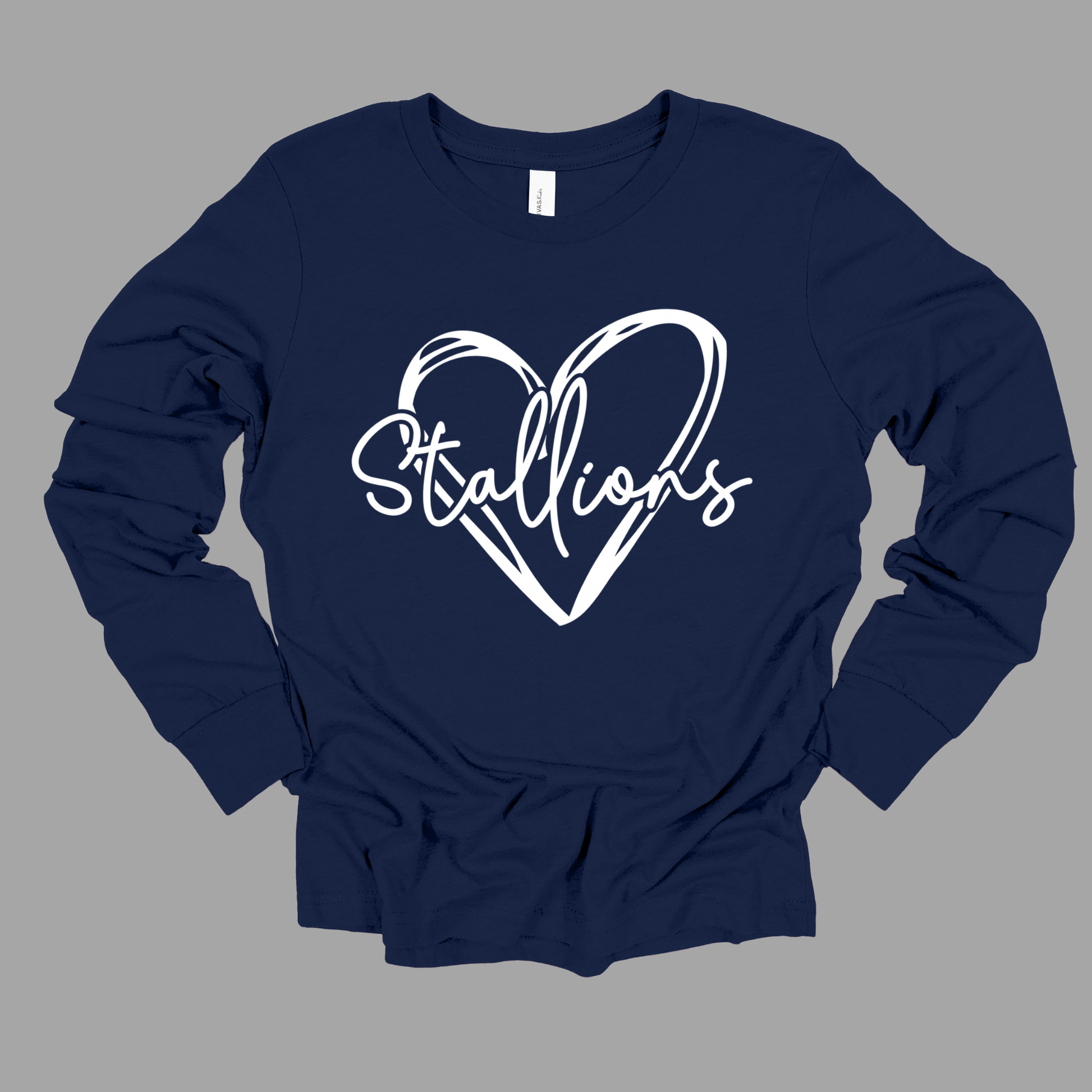 A navy blue long-sleeve t-shirt with a white graphic on the chest featuring a hand-drawn heart outline and the word 'Stallions' in script, displayed against a solid gray background.