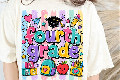 A close-up of a person wearing a cream-colored t-shirt with a colorful 'Fourth Grade' graphic print featuring school-themed illustrations like a graduation cap, backpack, apple, and blocks.