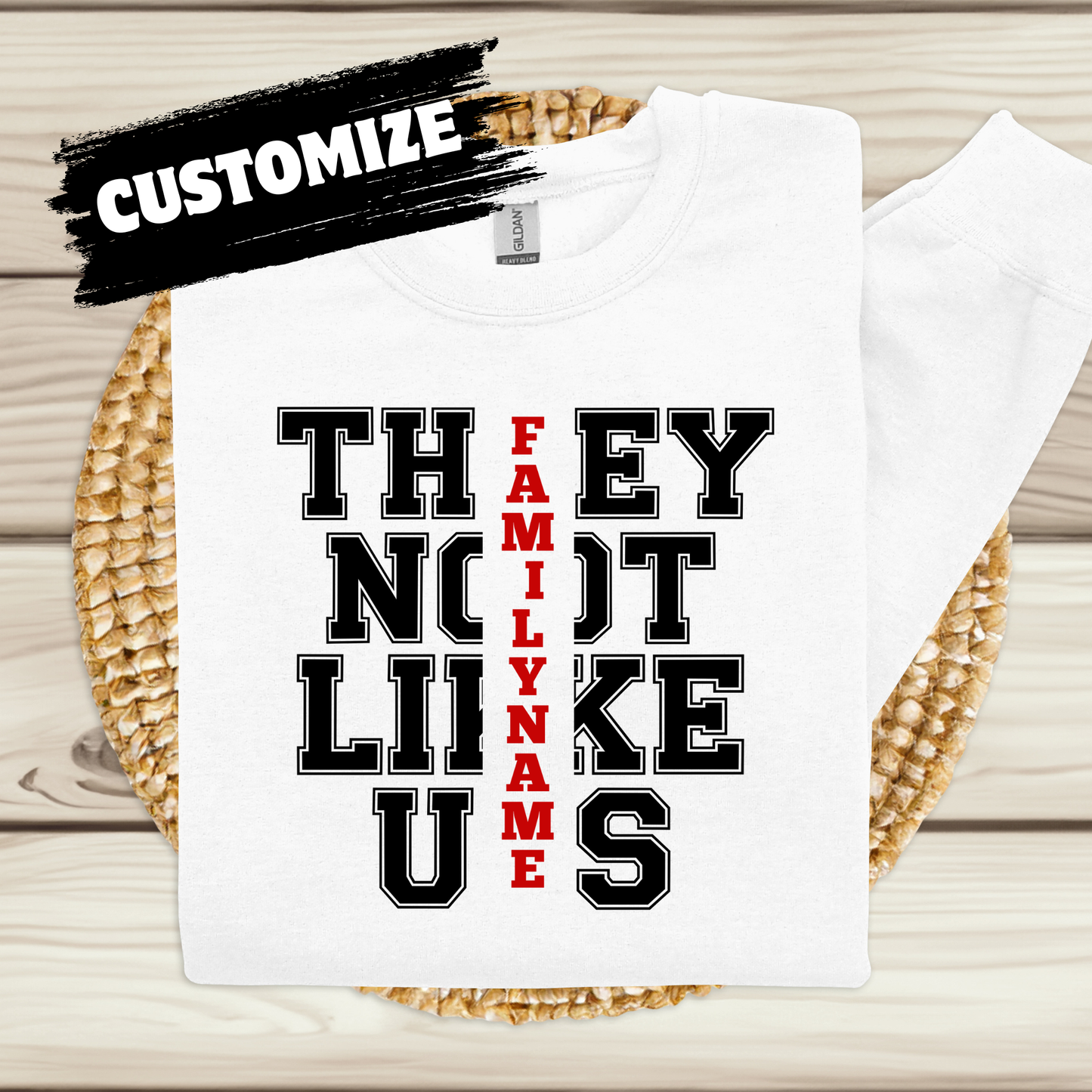 White t-shirt with customizable text design on a wooden surface CUSTOMIZE