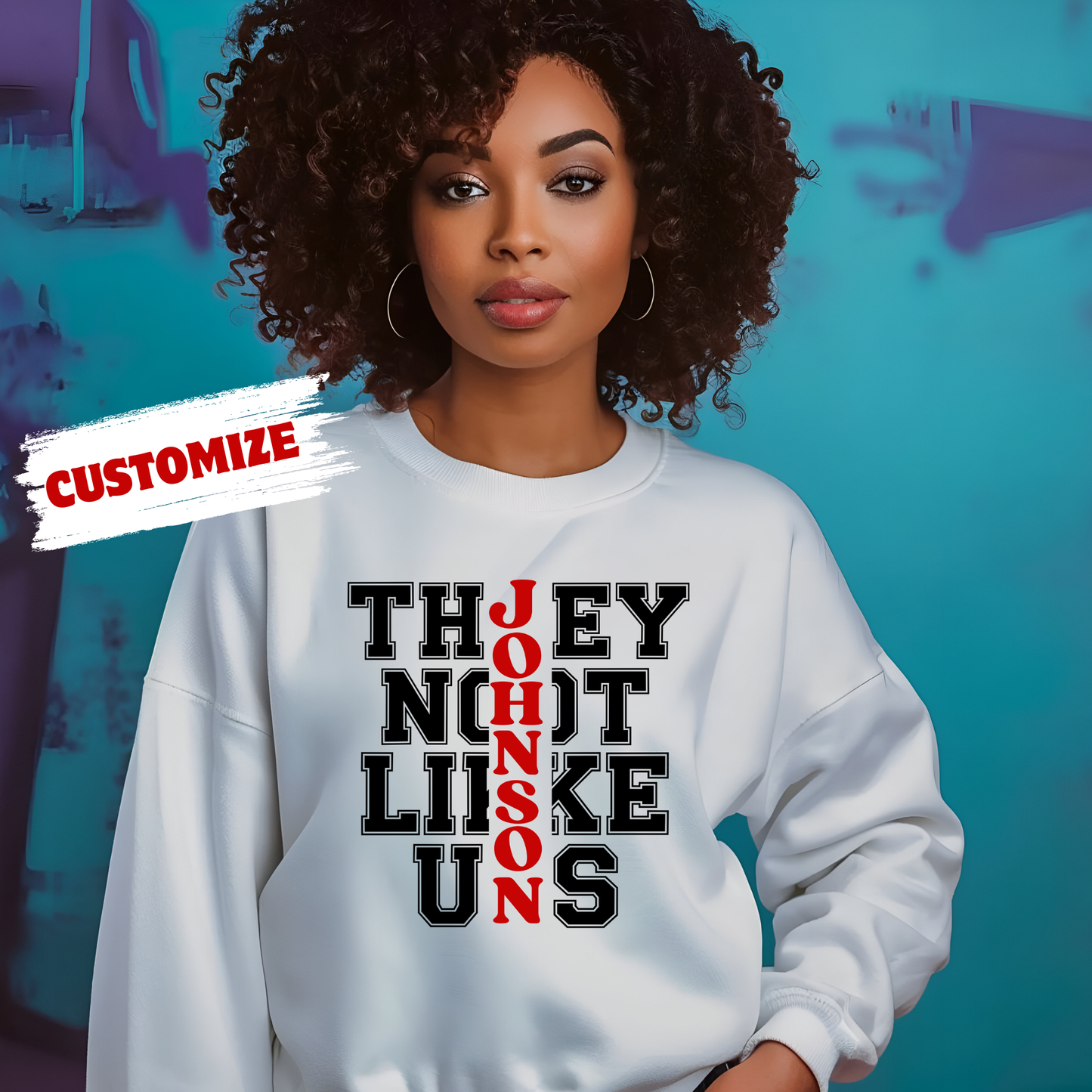 Person wearing a white sweatshirt with text design on a blue background  CUSTOMIZE