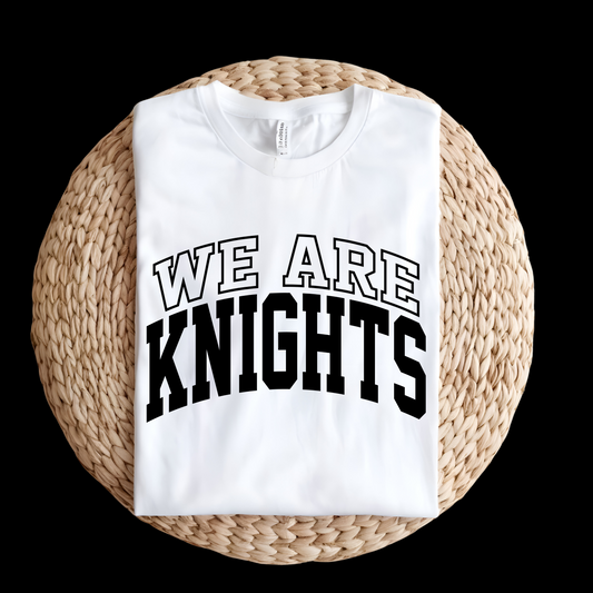 White sweatshirt with 'WE ARE KNIGHTS' text on a woven mat  Knights School Spirit Shirt - We Are Knights  - Rep the Knights Tee