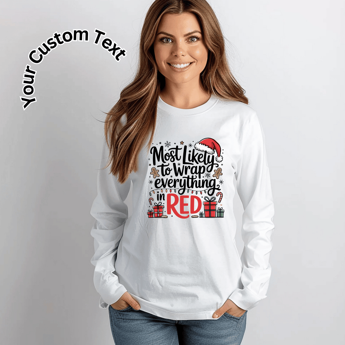A woman wearing a white long-sleeve crewneck sweatshirt with a festive Christmas graphic that reads 'Most likely to wrap everything in RED' with a Santa hat and gift boxes. The image has a 'Your Custom Text' overlay in the top left corner.