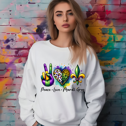 Celebrate Mardi Gras in style with our 'Peace, Love, Mardi Gras' women's sweatshirt. Perfect for Carnival Season, Fat Tuesday fun, parade watching, and festive celebrating carnival season. 