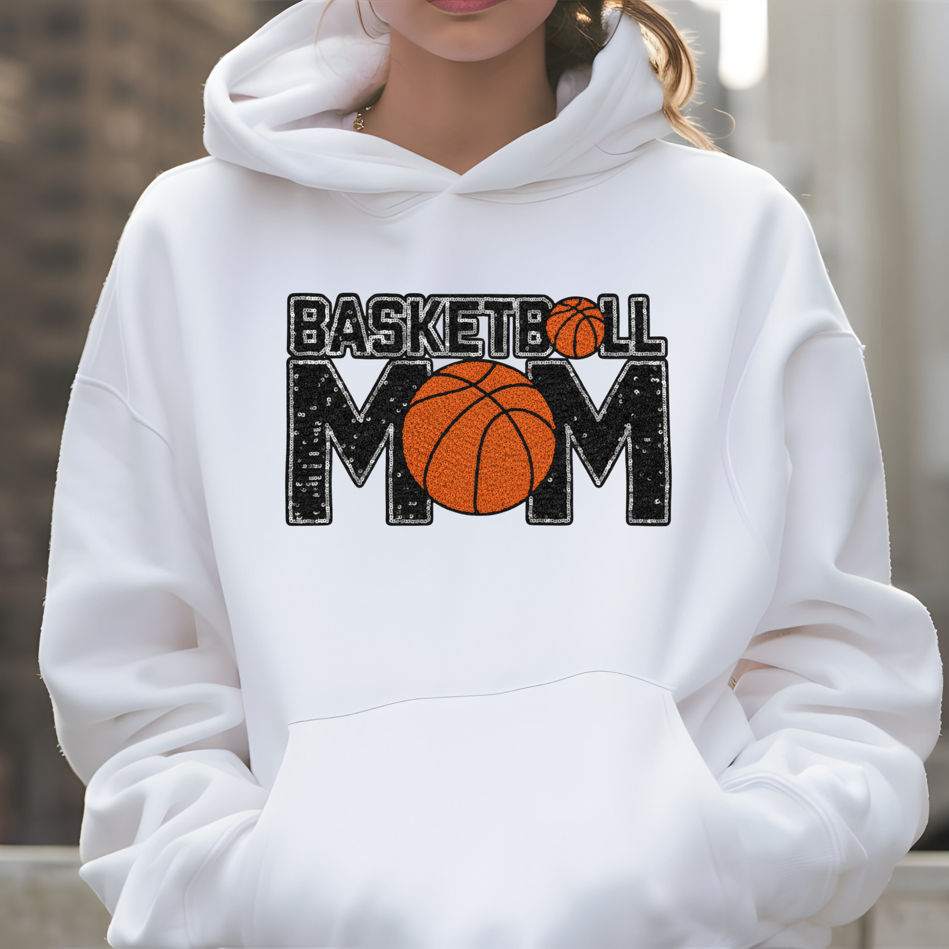 White hoodie with 'Basketball Mom' text and basketball graphic