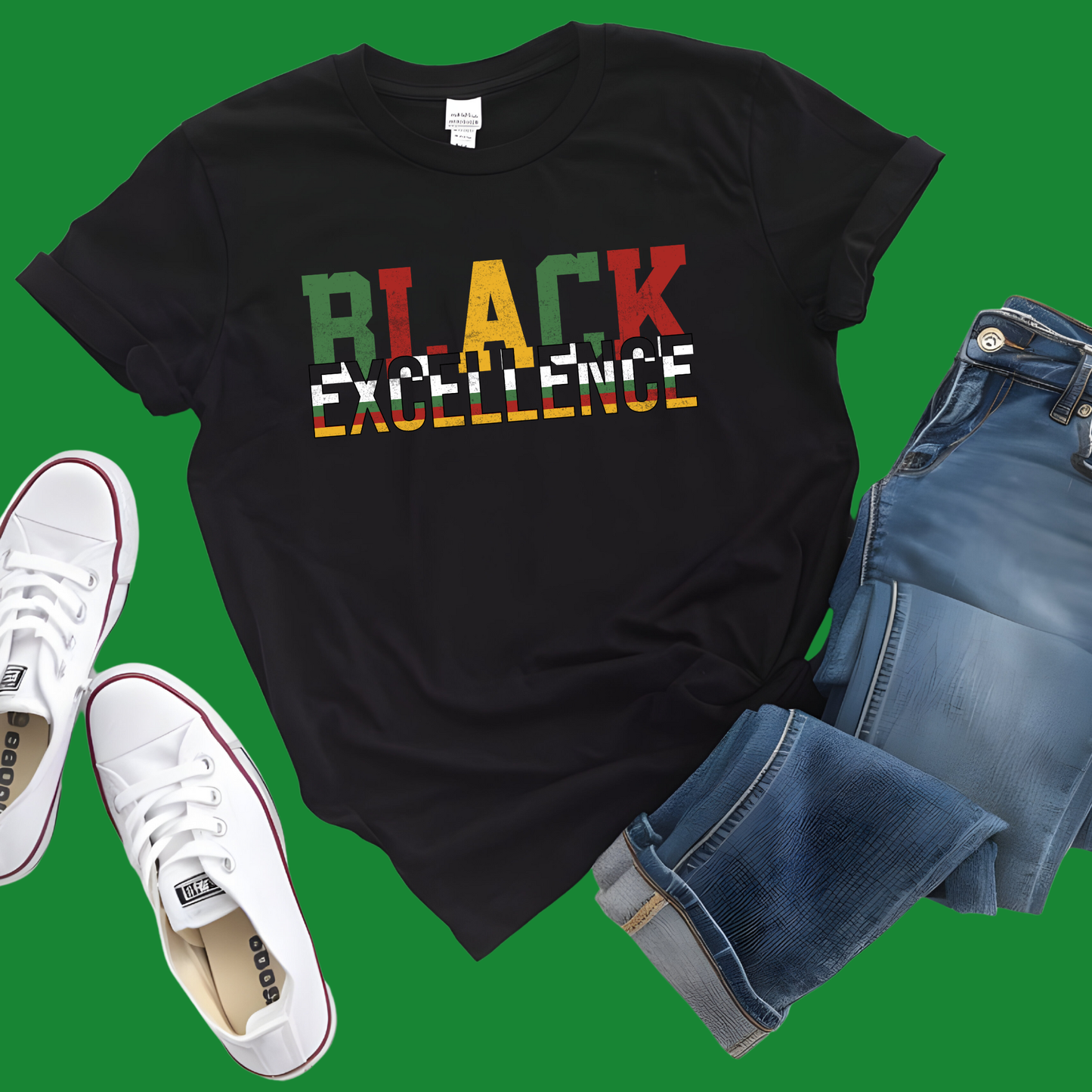 Black t-shirt with 'BLACK EXCELLENCE' text, white sneakers, and blue jeans on a green background