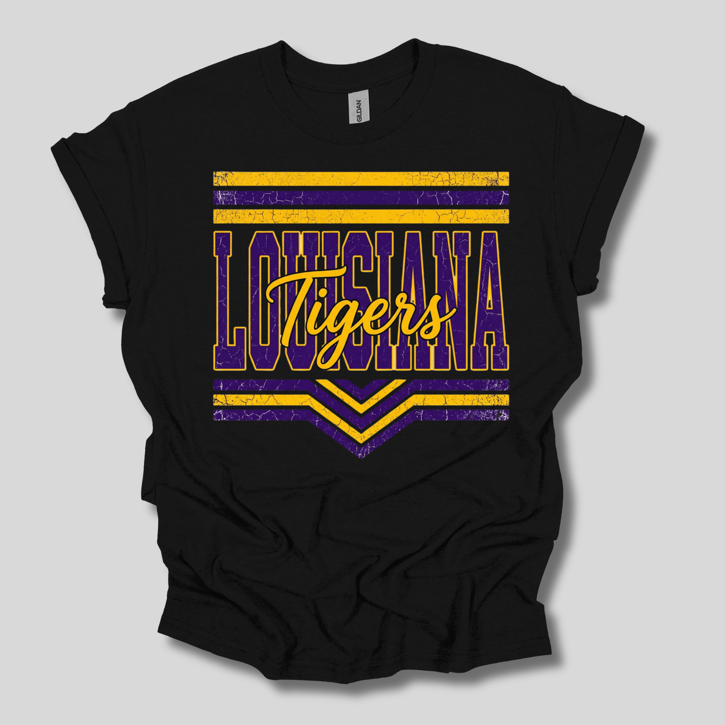 A black short-sleeve t-shirt with a distressed purple and yellow graphic reading 'LOUISIANA Tigers' on the front, shown against a light gray background.