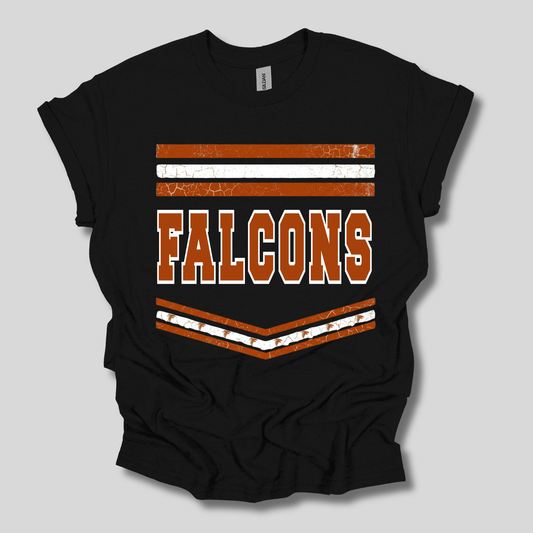A black short-sleeve t-shirt with a distressed orange and white graphic on the front featuring the word 'FALCONS' and chevron stripes, displayed on a neutral gray background.