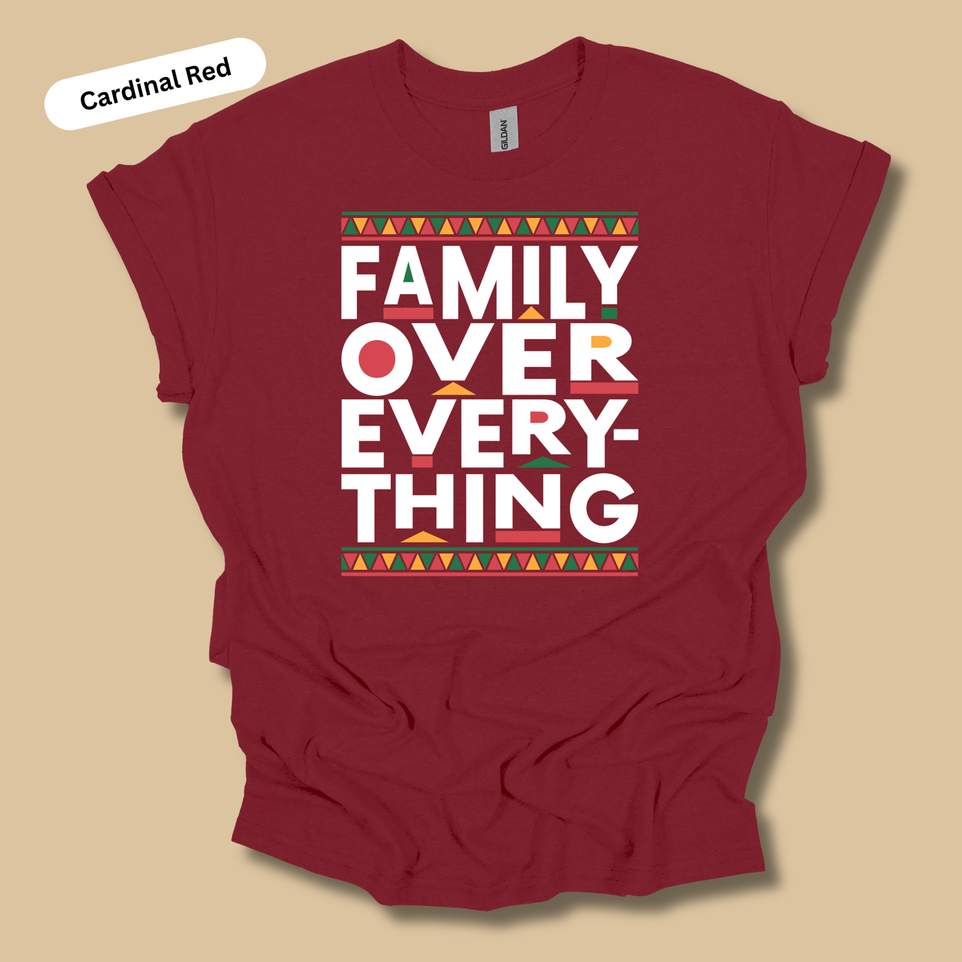 Cardinal red t-shirt with 'Family Over Everything' text on a beige background