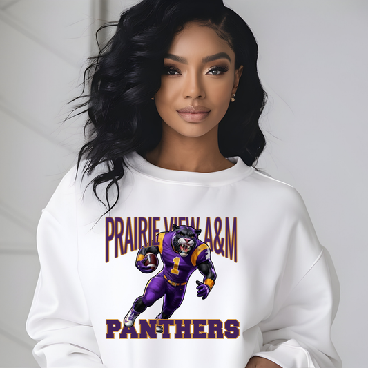 A woman wearing a white crewneck sweatshirt with a graphic of a purple and gold football player and the text 'PRAIRIE VIEW A&M PANTHERS'.