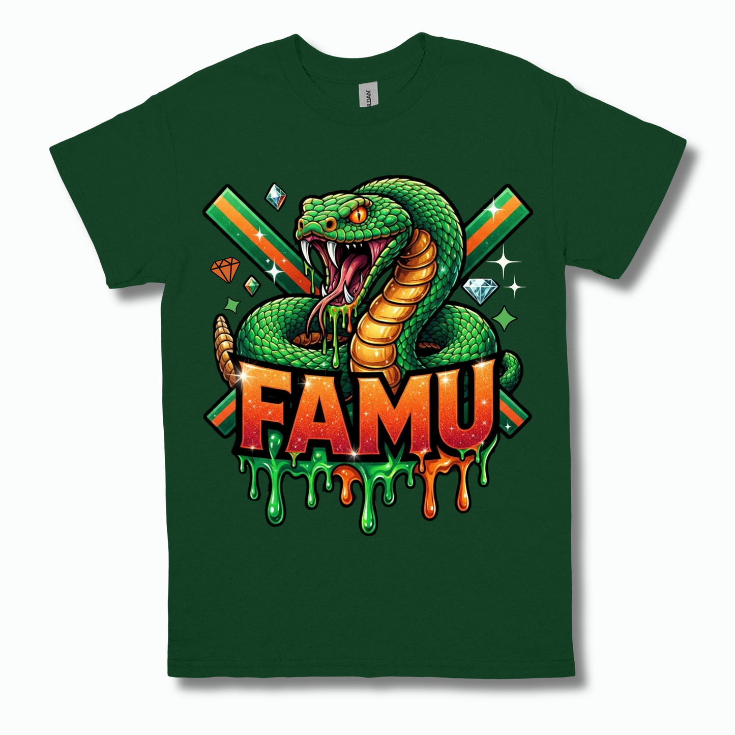 A dark green short-sleeve t-shirt with a colorful graphic print of a coiled green snake, crossed green and orange striped swords, diamonds, and the text 'FAMU' in dripping orange and green letters.