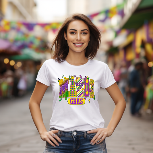 Woman wearing a white t-shirt with colorful design and 'GRAS' text in a festive setting.