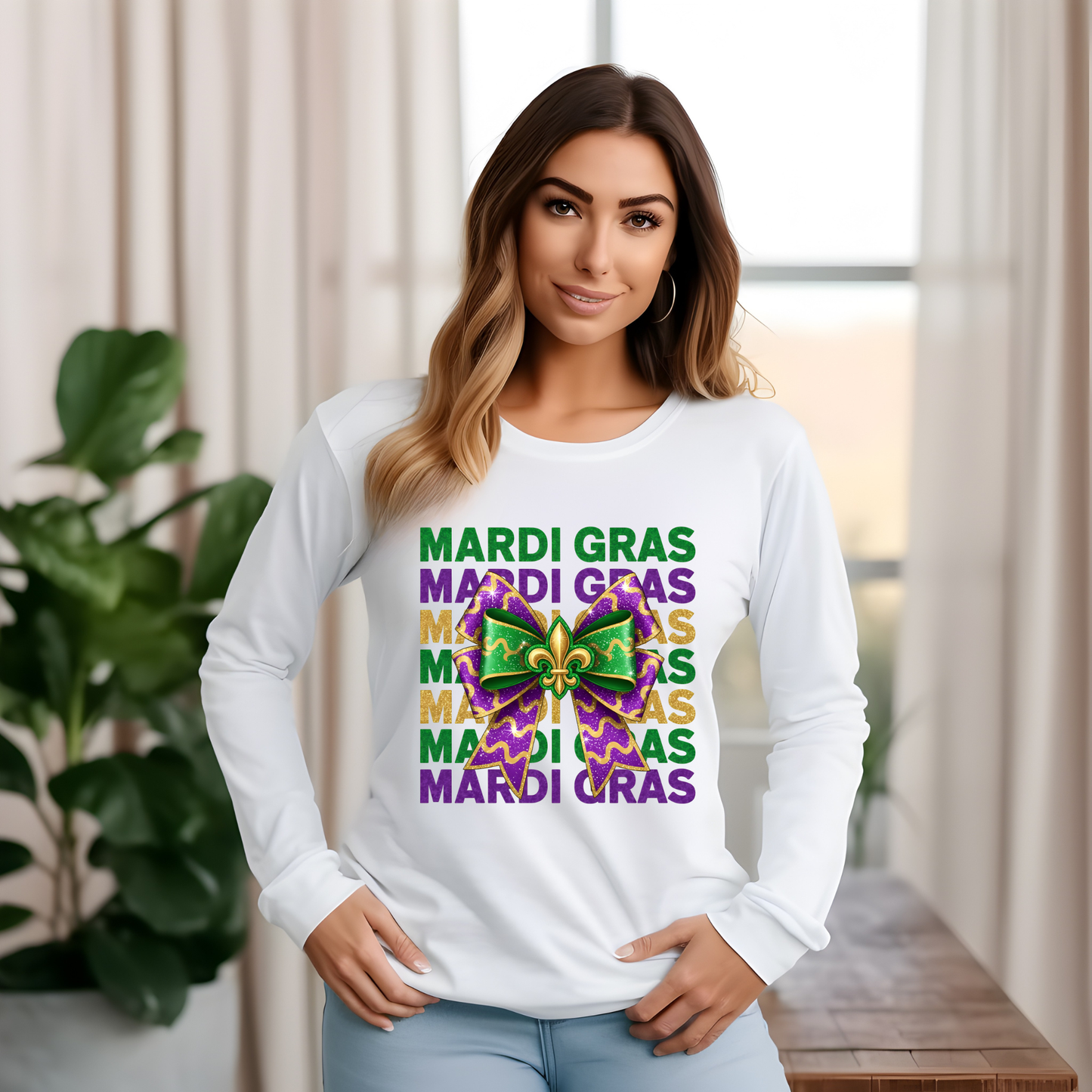 Woman wearing a white long-sleeve shirt with Mardi Gras-themed design indoors.