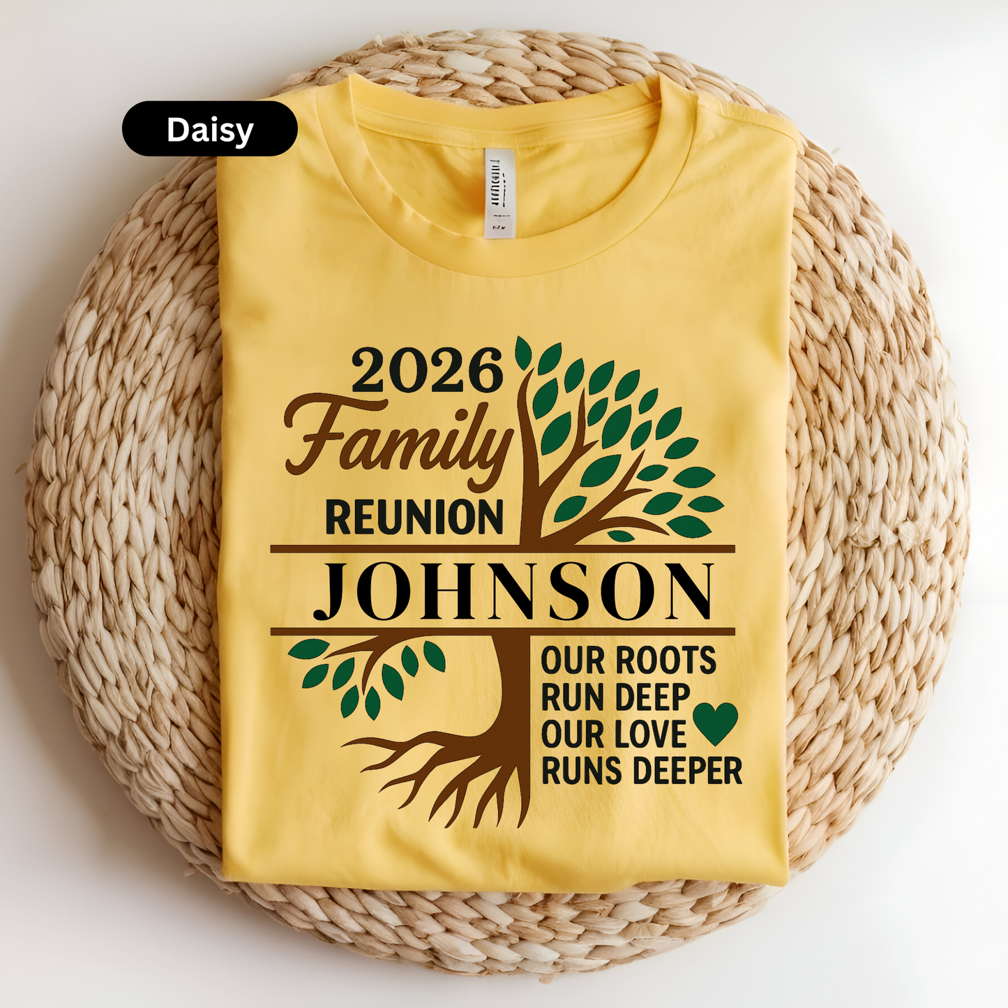 Yellow t-shirt with family reunion design on a woven surface