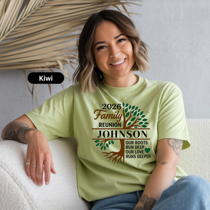 Woman wearing a light green t-shirt with '2026 Family Reunion Johnson' design, sitting on a white couch.