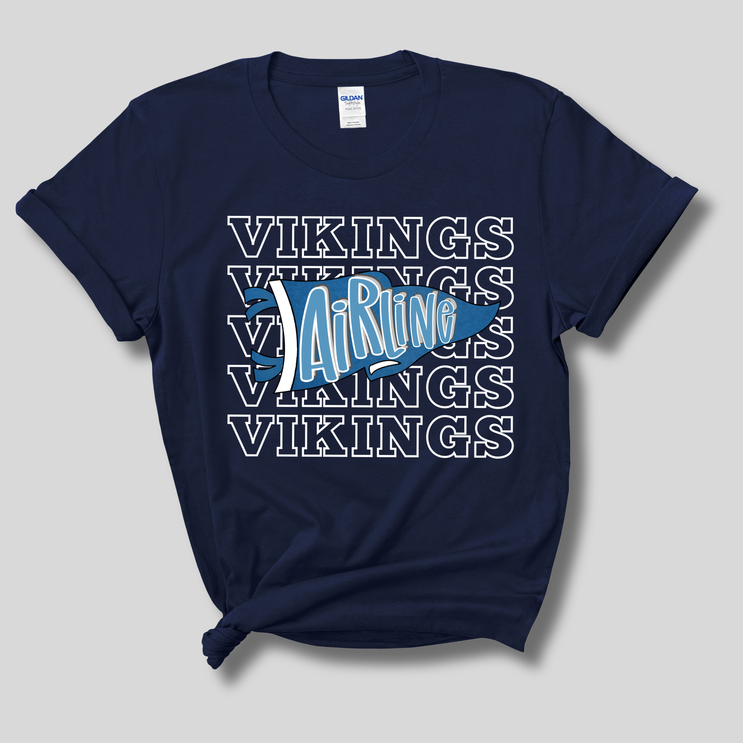 A navy blue short-sleeve t-shirt with a graphic design on the front. The design features the word 'VIKINGS' repeated in white outline text, overlaid with a blue and white pennant graphic containing the stylized text 'AirRune'.