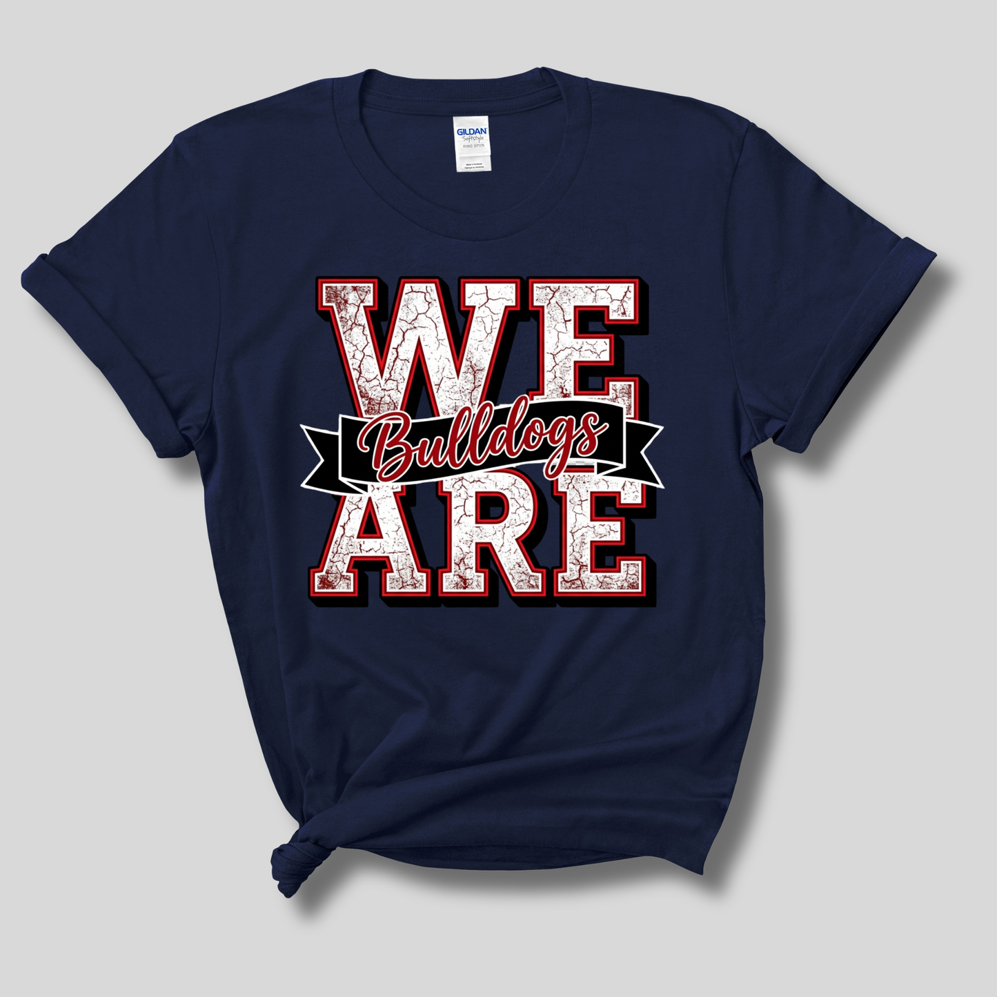 A navy blue Gildan t-shirt with a distressed red and white graphic that reads 'WE ARE Bulldogs' on a light gray background.