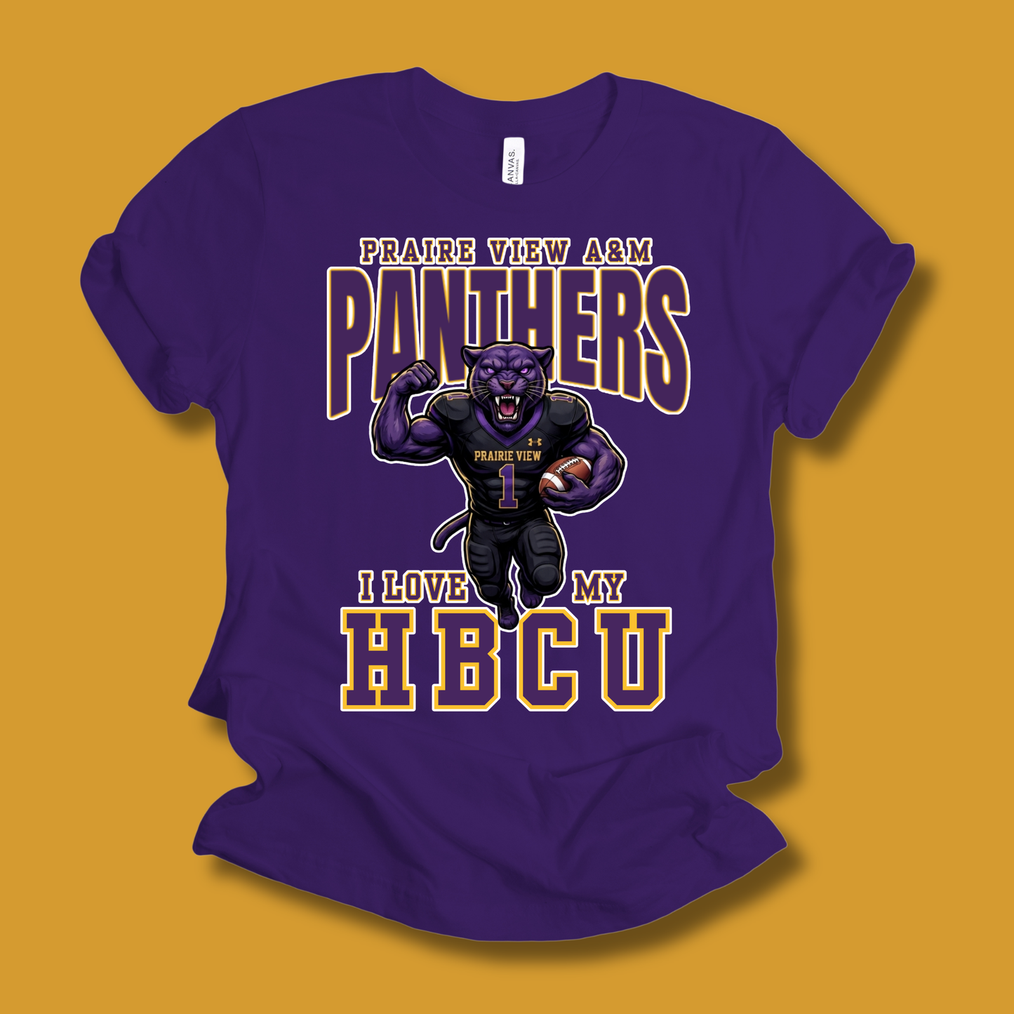 A purple short-sleeve t-shirt with a graphic of a purple panther football player and the text 'PRAIRIE VIEW A&M PANTHERS I LOVE MY HBCU', displayed on a solid mustard yellow background.