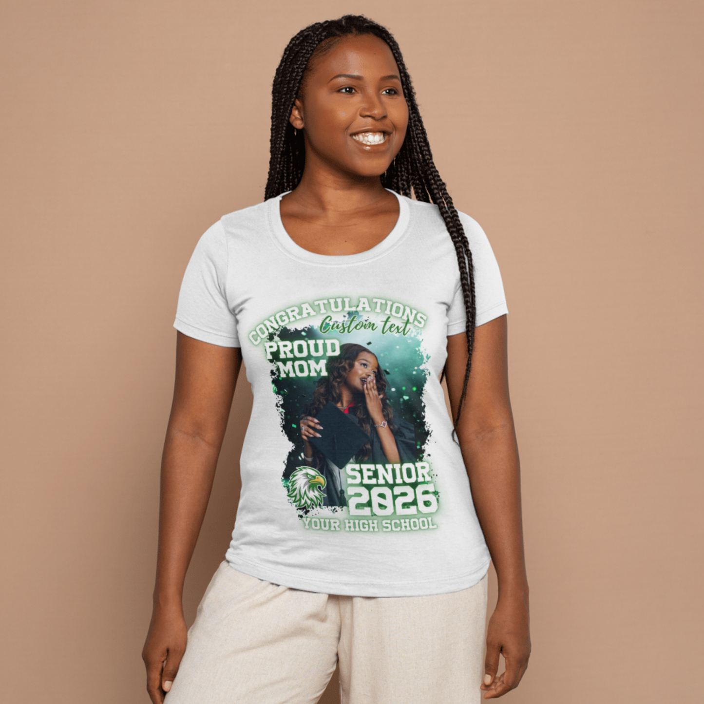 Person wearing a white t-shirt with a graphic design on a beige background Customizable graduation photo t-shirt featuring senior portrait, school mascot, and sports organization logos in school colors