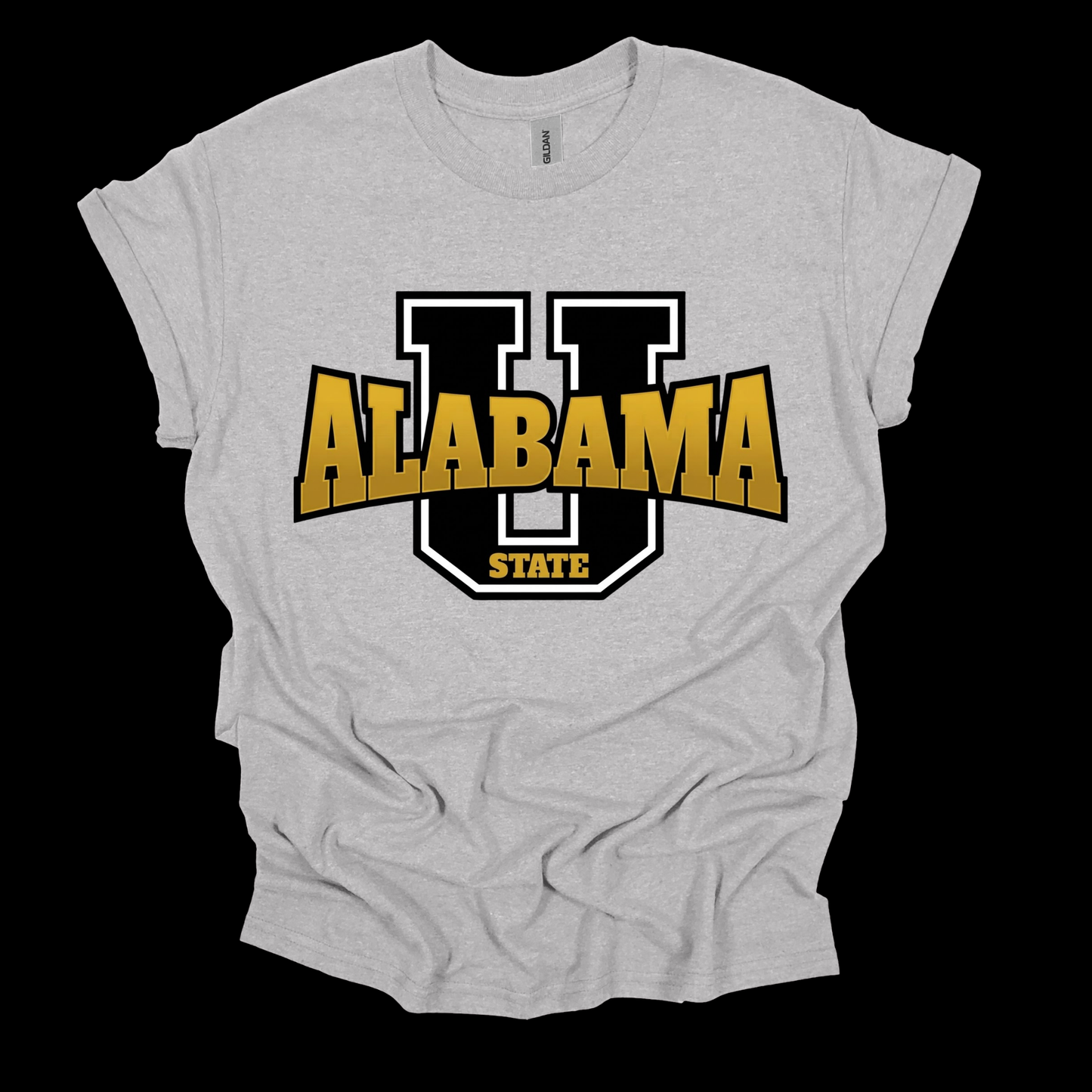 A light heather gray t-shirt with a graphic of a large black and white 'U' outline, filled with the word 'ALABAMA' in bold gold letters, and 'STATE' in gold below it, displayed on a solid black background.