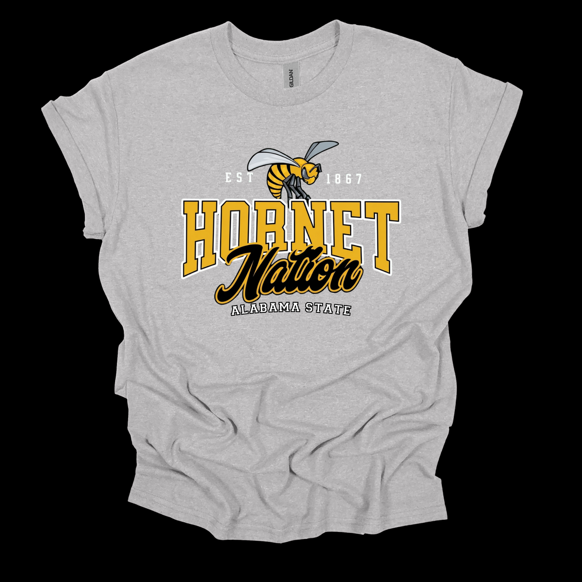 A light heather gray t-shirt with a 'Hornet Nation Alabama State' graphic on the front, featuring a yellow and black bee and varsity-style lettering, displayed against a solid black background.