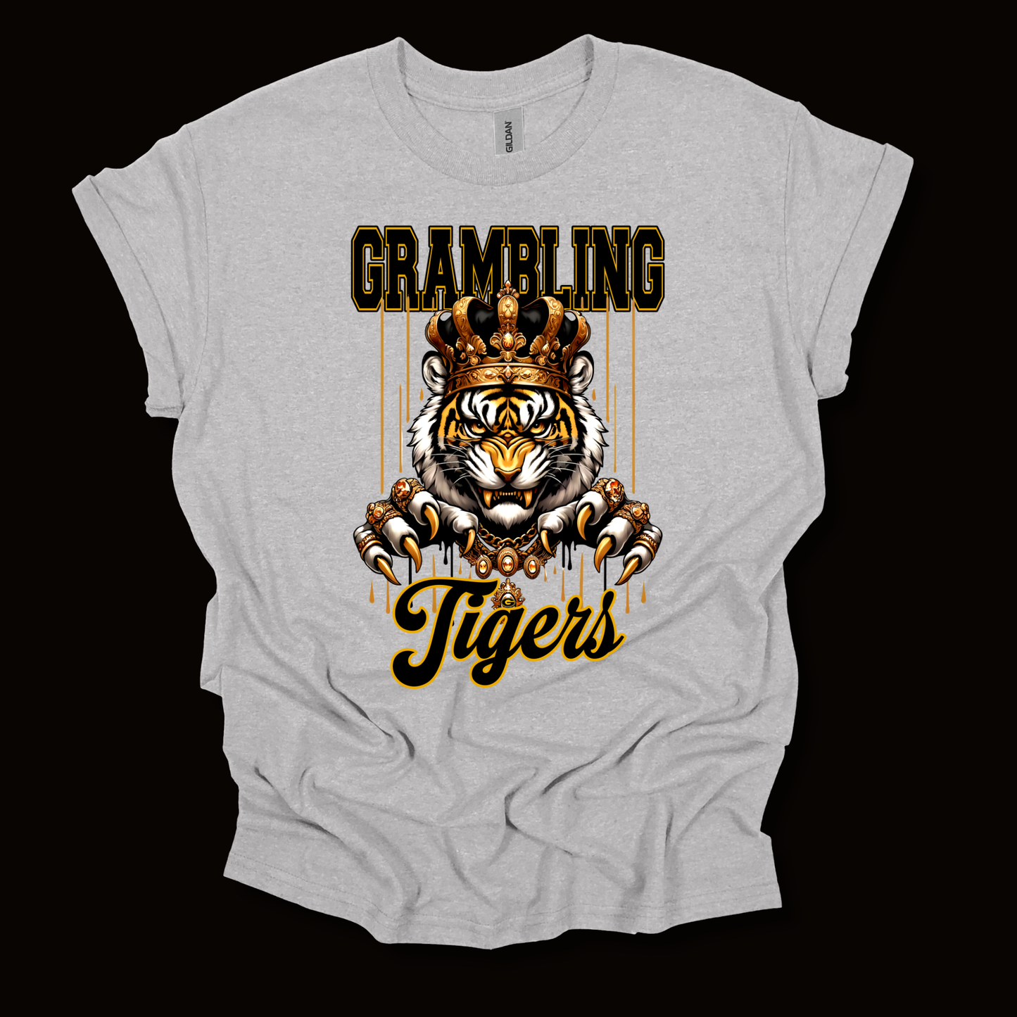 A light heather gray t-shirt with a graphic print of a tiger wearing a crown, with the text 'GRAMBLING' above and 'Tigers' below, displayed against a solid black background.