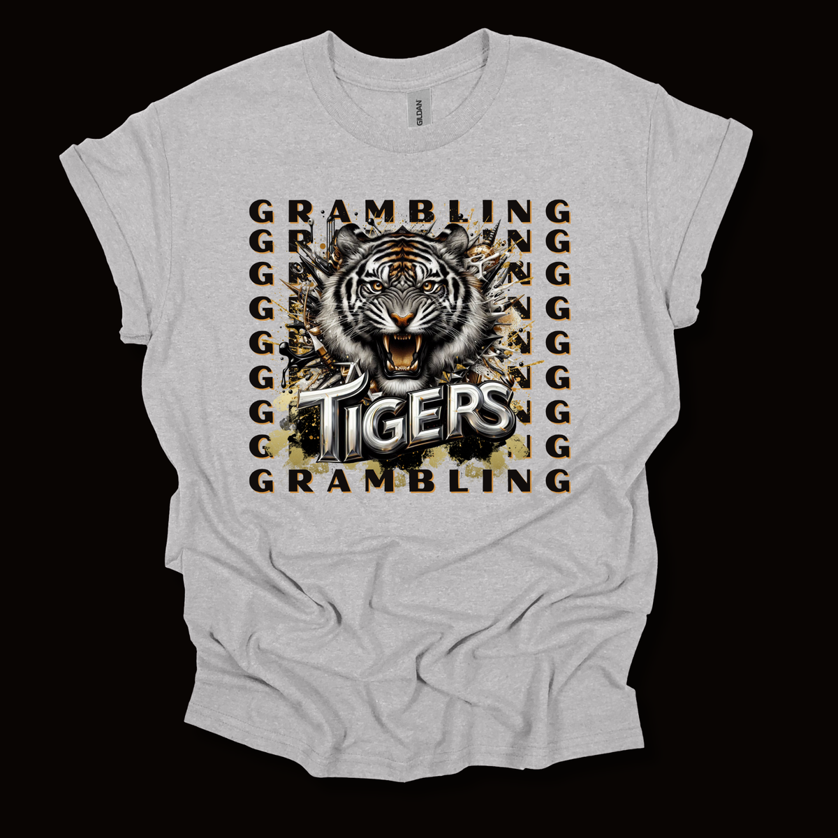 A light gray heather t-shirt with a graphic print of a tiger's face surrounded by the word 'GRAMBLING' repeated in a vertical pattern, with 'TIGERS' written across the bottom in bold white letters with black outlines.