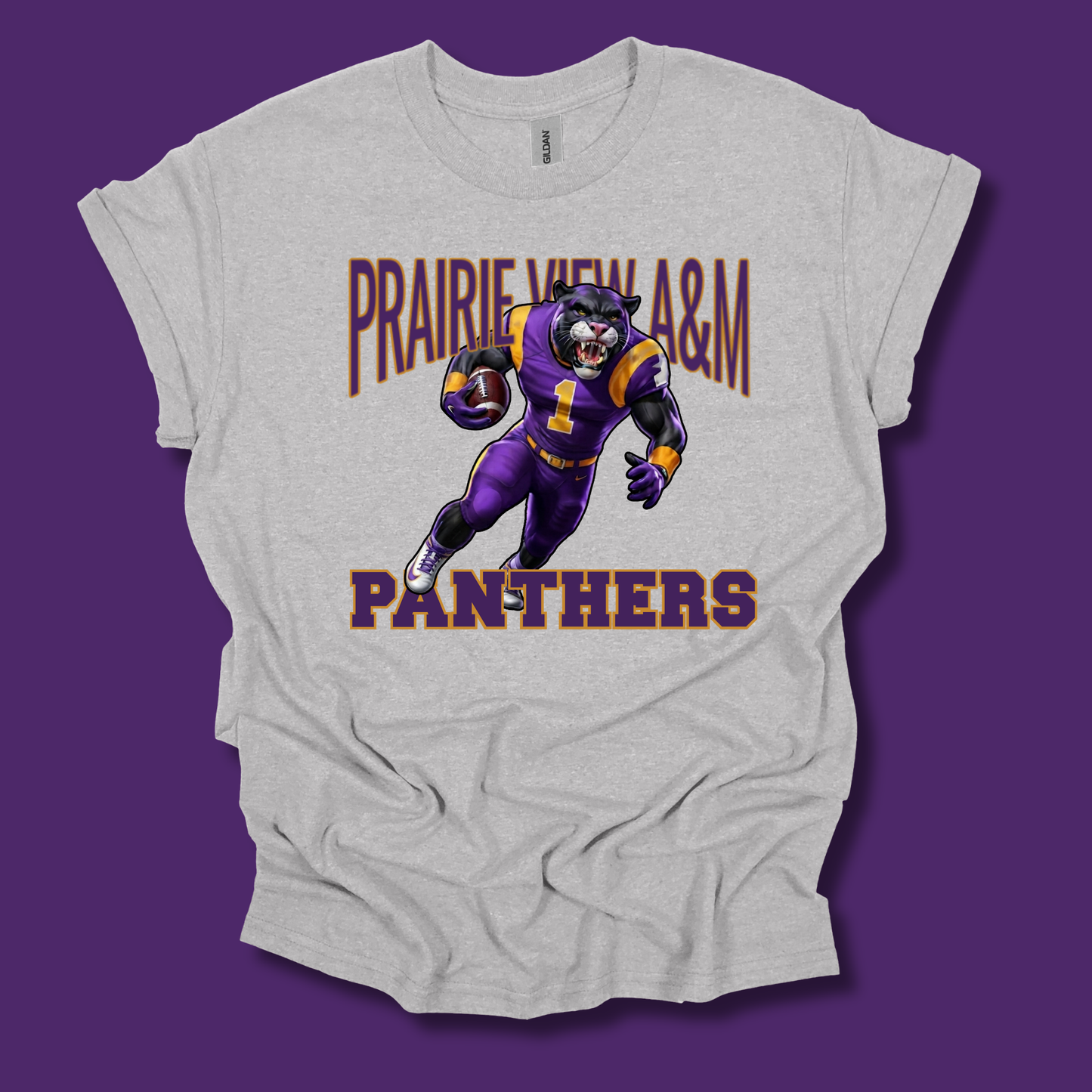 A light heather gray graphic t-shirt featuring a cartoon illustration of a purple and gold football player with the text 'PRAIRIE VIEW A&M PANTHERS' on a solid purple background.