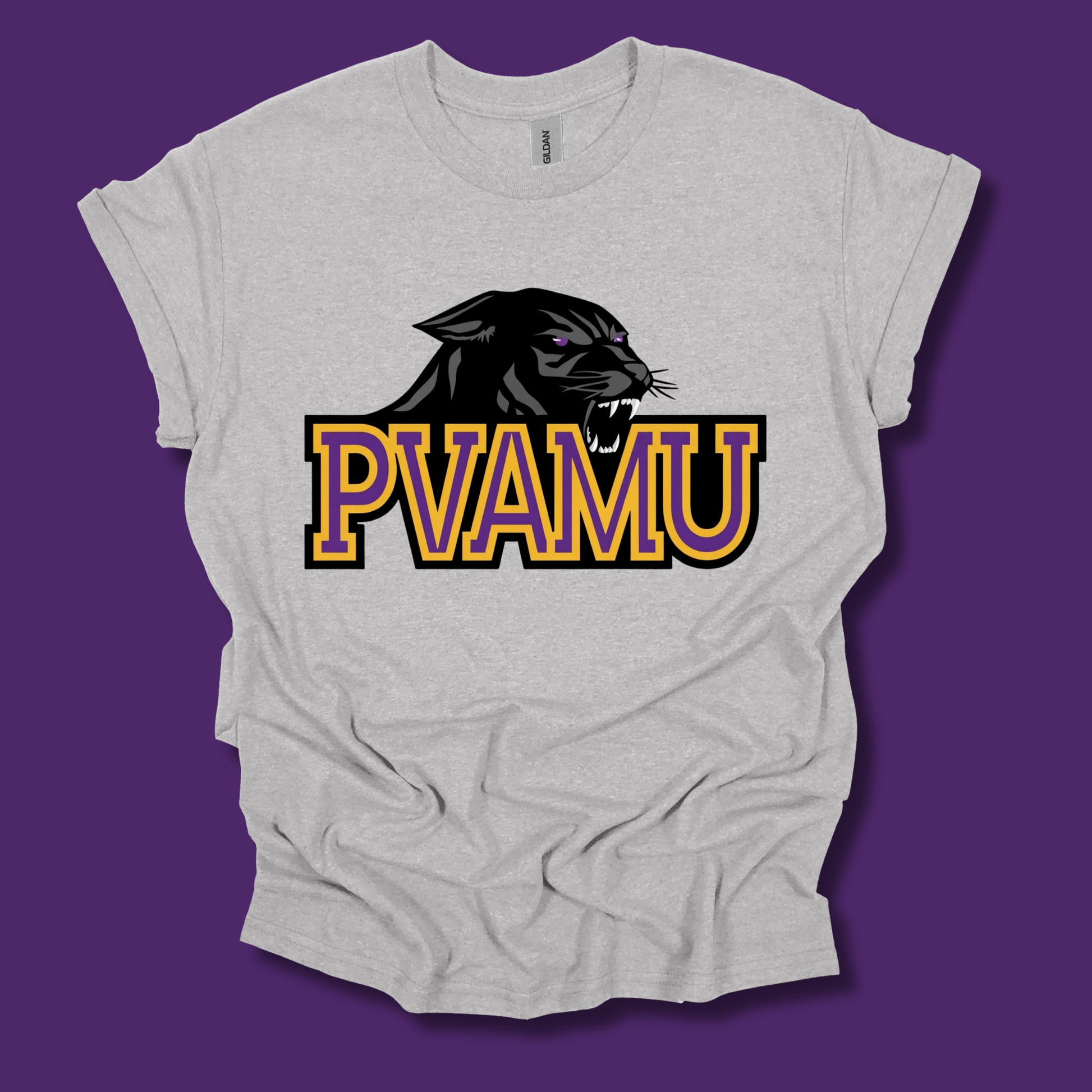 A light heather gray t-shirt with a graphic of a black panther head and the text 'PVAMU' in yellow and purple outlined block letters, displayed against a solid purple background.