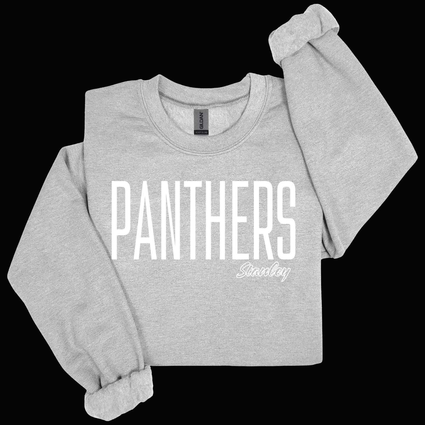 A light heather gray long-sleeve sweatshirt with rolled cuffs, featuring a distressed yellow and black graphic on the front that reads 'GRAMBLING' with horizontal stripes above and chevron stripes below, shown on a solid black background.