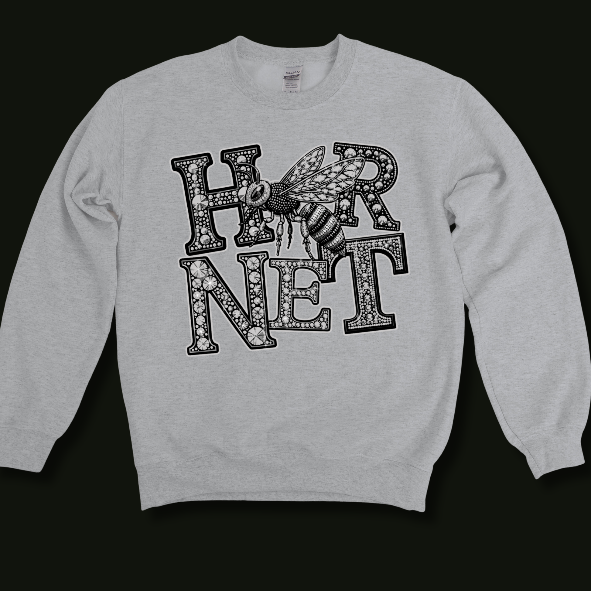 A light heather gray crewneck sweatshirt featuring a cartoon bulldog graphic wearing blue sunglasses with the text 'RULL DOGS' in white, displayed against a solid dark blue background.