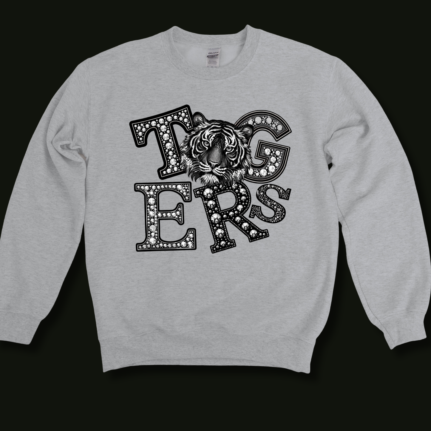 A light heather gray crewneck sweatshirt featuring a distressed purple and yellow graphic on the chest that reads 'LOUISIANA Tigers' with horizontal stripes and chevron details, shown against a solid black background.
