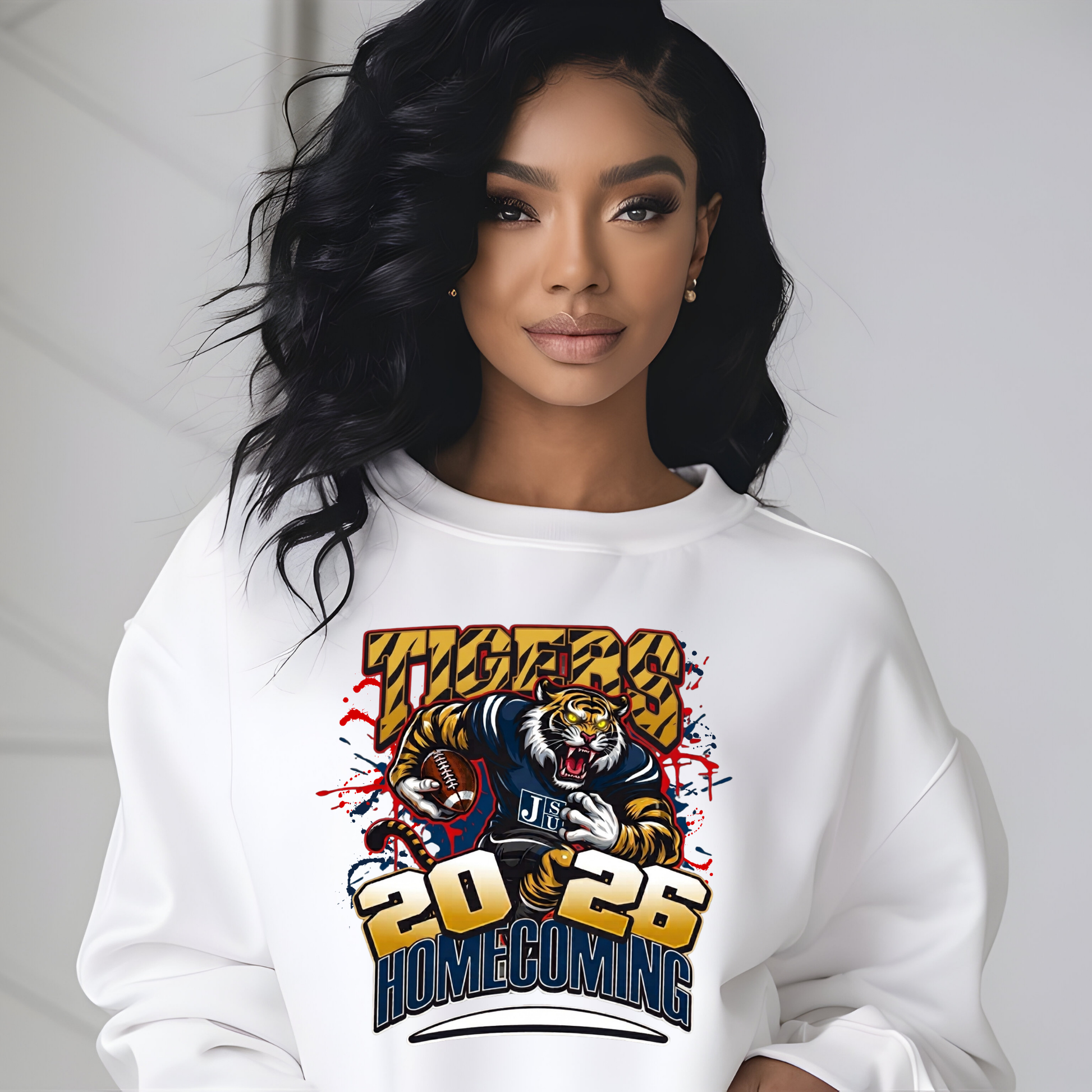 A woman wearing a white crewneck sweatshirt with a graphic print of a purple panther football player and the text 'PRAIRIE VIEW A&M PANTHERS I LOVE MY HBCU'.