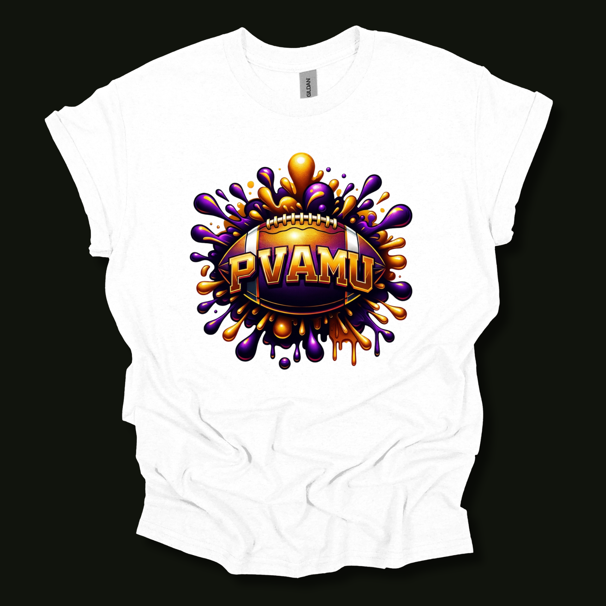 A white short-sleeve t-shirt with a large graphic print on the front. The graphic features a football-shaped badge with the text 'PVAMU' in gold, surrounded by a purple and orange paint splatter design, set against a solid black background.
