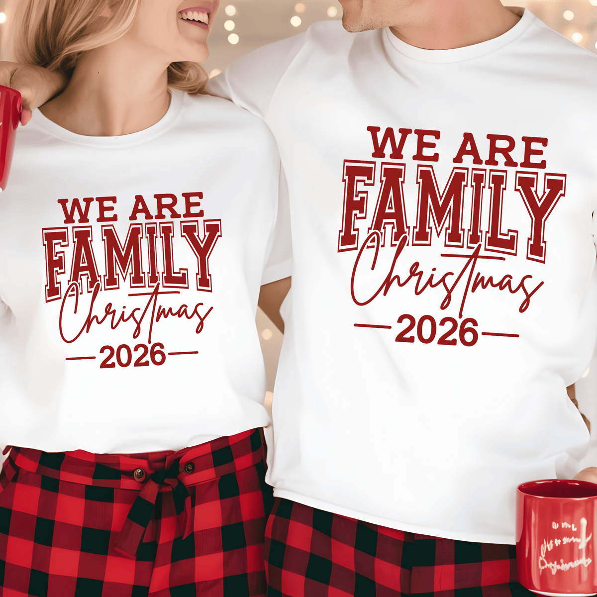 Set of five black matching family t-shirts printed with white 'We Are Family Christmas 2026' collegiate typography on a wooden backdrop.