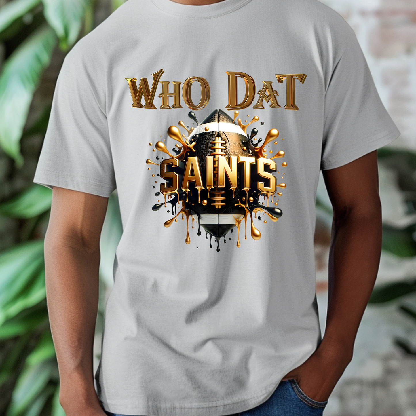 Person wearing a gray t-shirt with 'WHO DAT SAINTS' graphic design. Saints Football Shirt - Who Dat Saints Football Game Day T-Shirt
